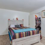 Bedroom and closet inside a model apartment